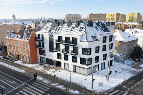 Budynek usługowo-mieszkalny w Poznaniu powstał na miejscu zdegradowanej przestrzeni. Autor projektu: EASST ARCHITECTS