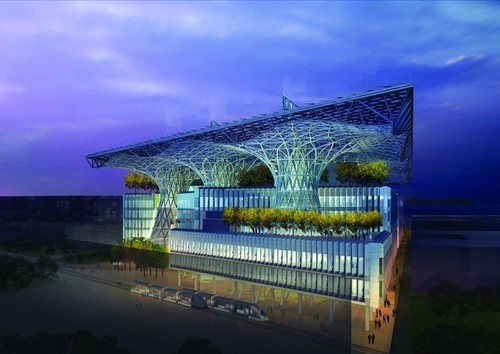 Masdar Headquarters nocą. © Adrian Smith + Gordon Gill Architecture. Pierwszy na świecie budynek o dodatnim bilansie energetycznym.